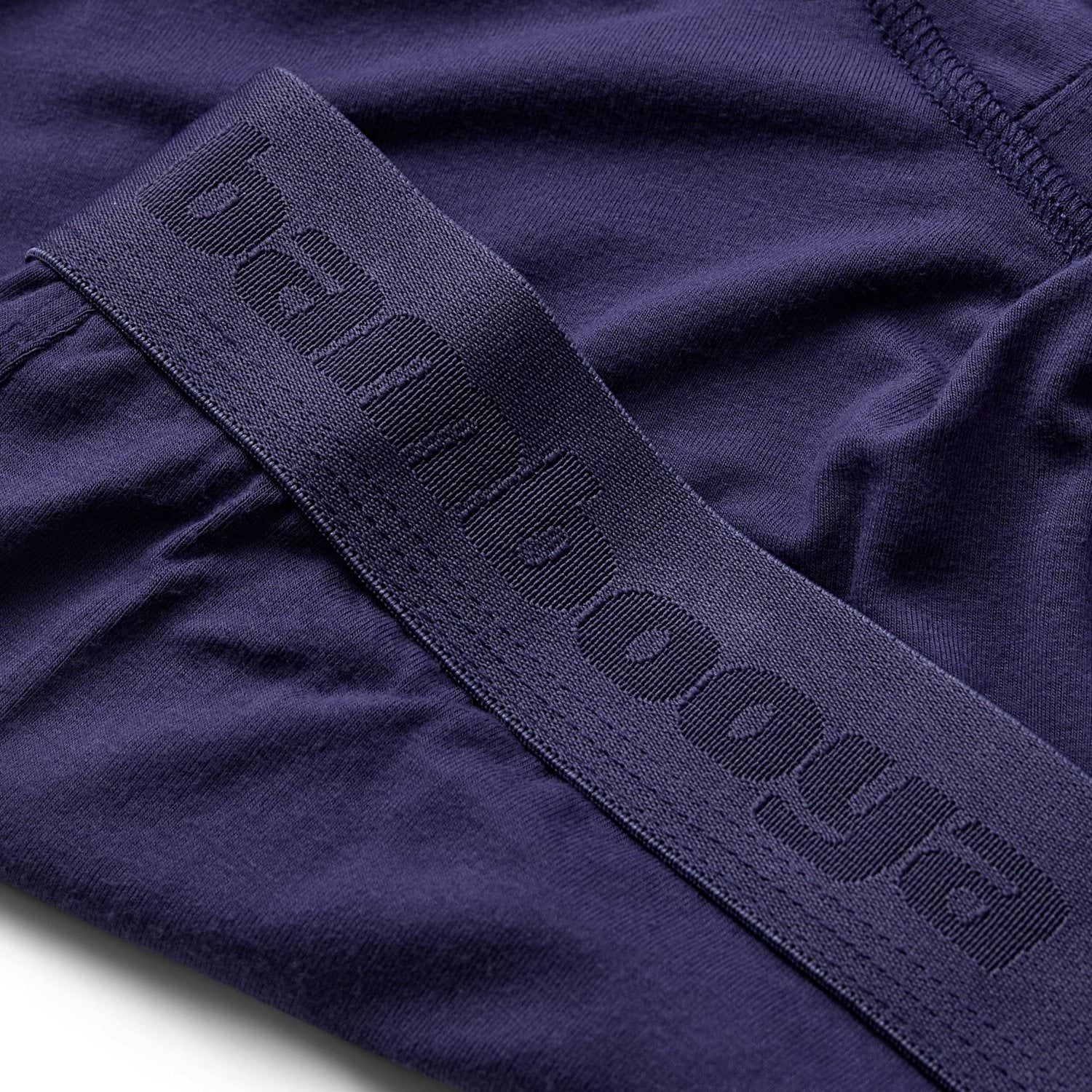 Blå bambus herre boxershorts, closeup af Bambooya logo på elastik